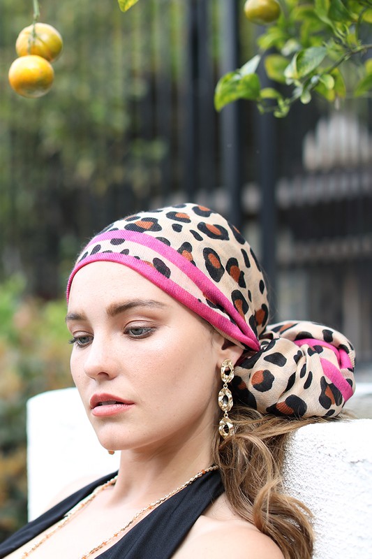 Urbanista Leopard Scarf with Pink Stripe As A Head Wrap